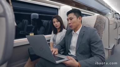 成功商务人士在高铁上使用笔记本电脑